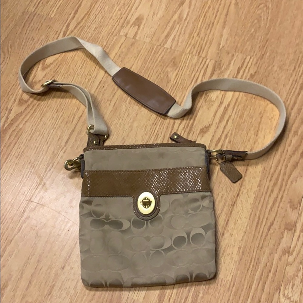 Brown coach crossbody peach inside gold hardware